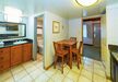 Gallery Thumbnail (2 Queens - Hotel Room Dining Area)