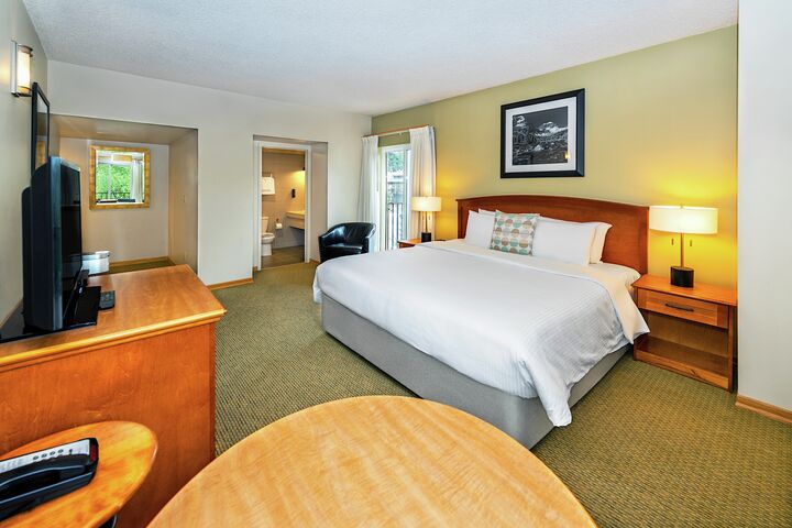 1 King - Hotel Room Sleeping Area