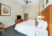 Gallery Thumbnail (Premium Room - 2 Queens - Hotel Room Sleeping Area)