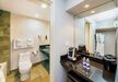 Gallery Thumbnail (Premium Room - 2 Queens - Hotel Room Bathroom)