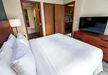 Gallery Thumbnail (Renovated - 1 Bdrm Premium Suite Bedroom)