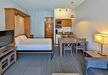 Gallery Thumbnail (#104 - Studio Sleeping Area, Dining Area & Kitchenette)