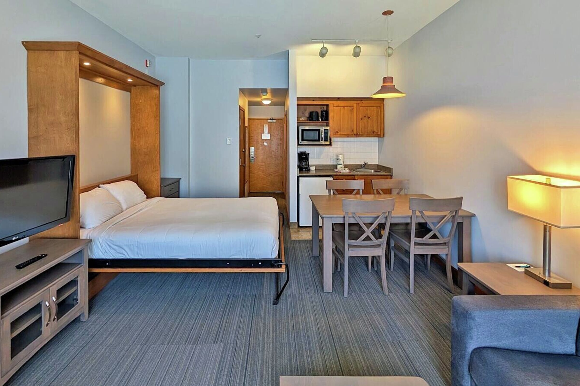 #104 - Studio Sleeping Area, Dining Area & Kitchenette