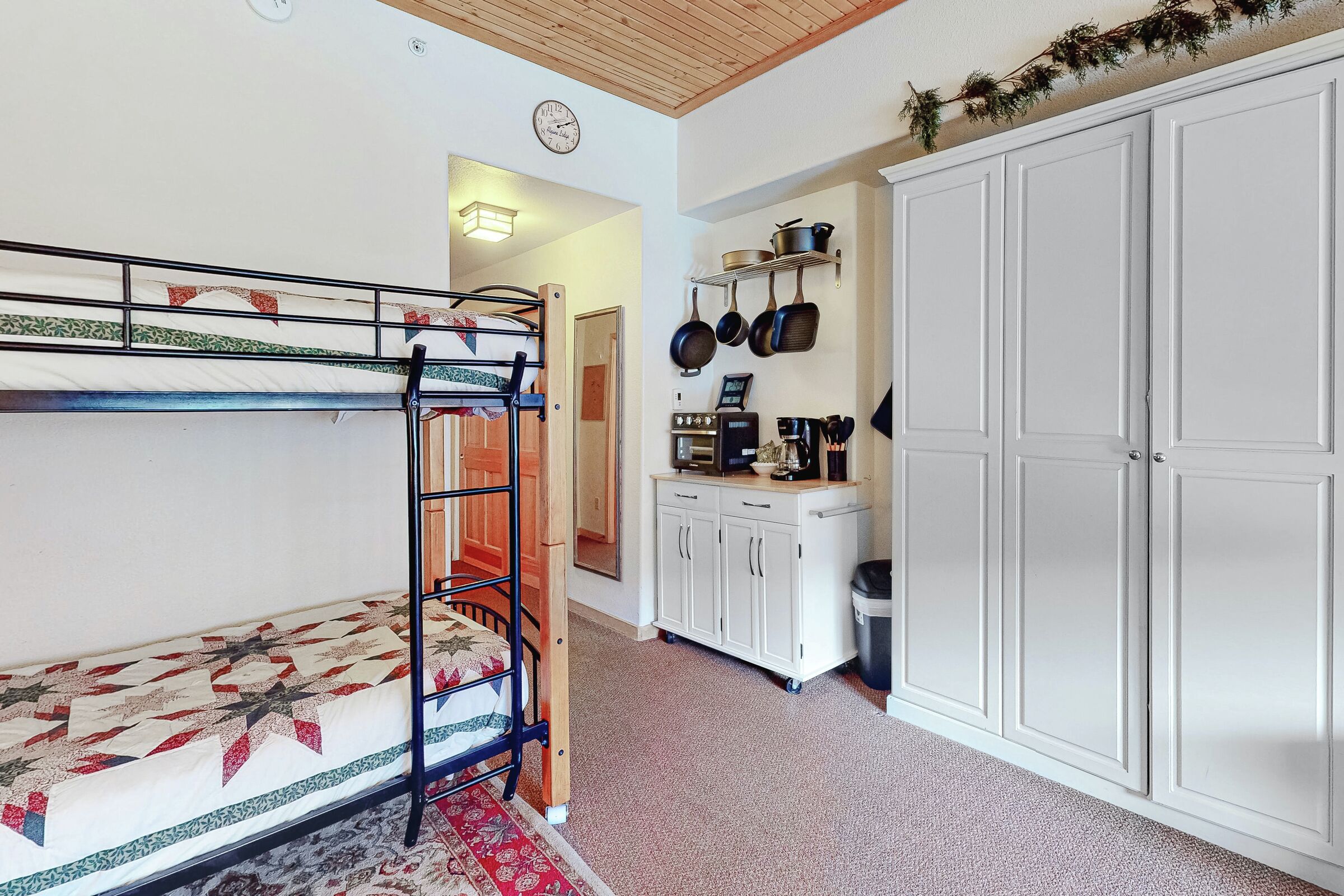 Studio Sleeping Area and Kitchenette
