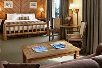 King Suite - Bedroom & Living Area