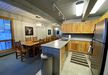 Gallery Thumbnail (#207 Trails - Dining Area & Kitchen)