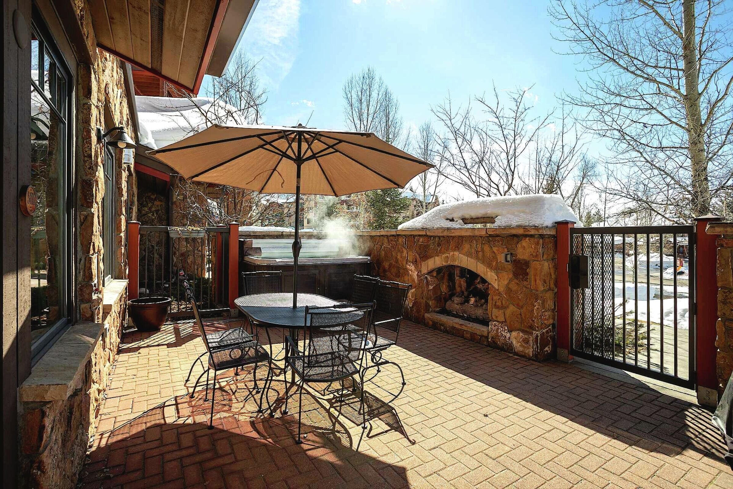 Patio with Hot Tub & Outdoor Fireplace