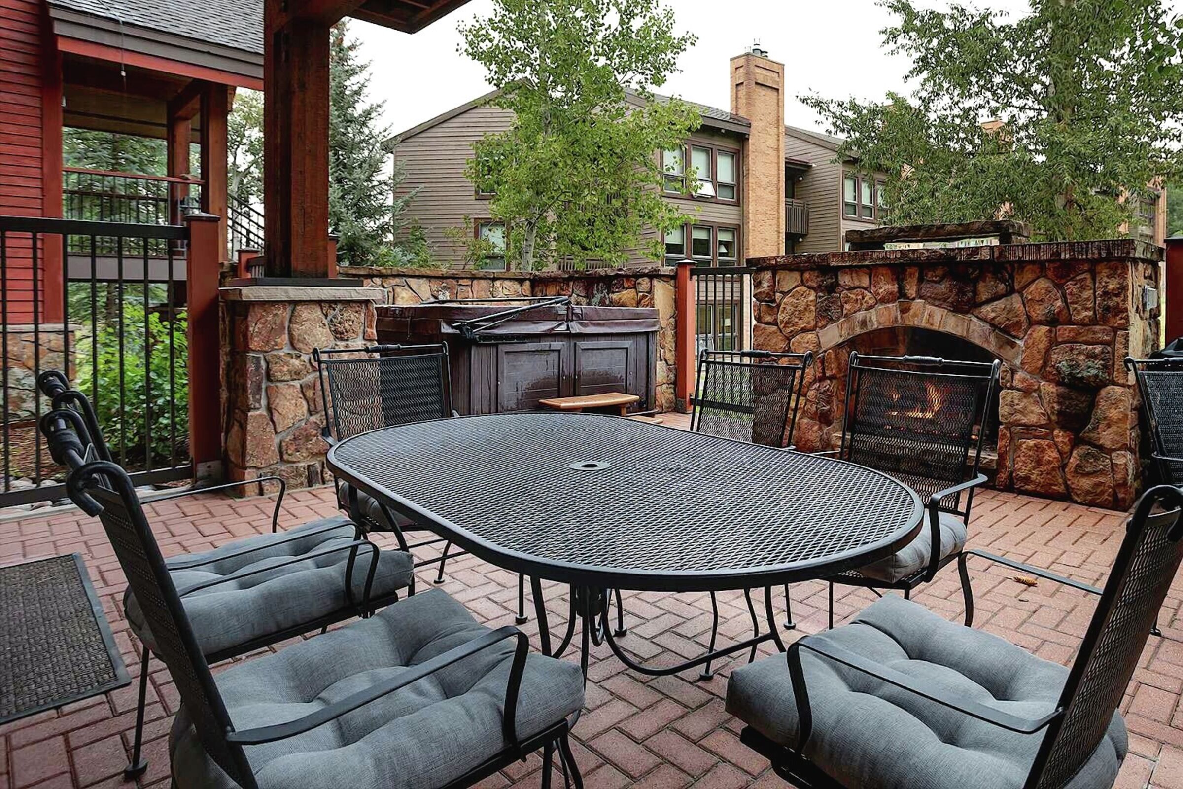 Patio with Hot Tub & Outdoor Fireplace