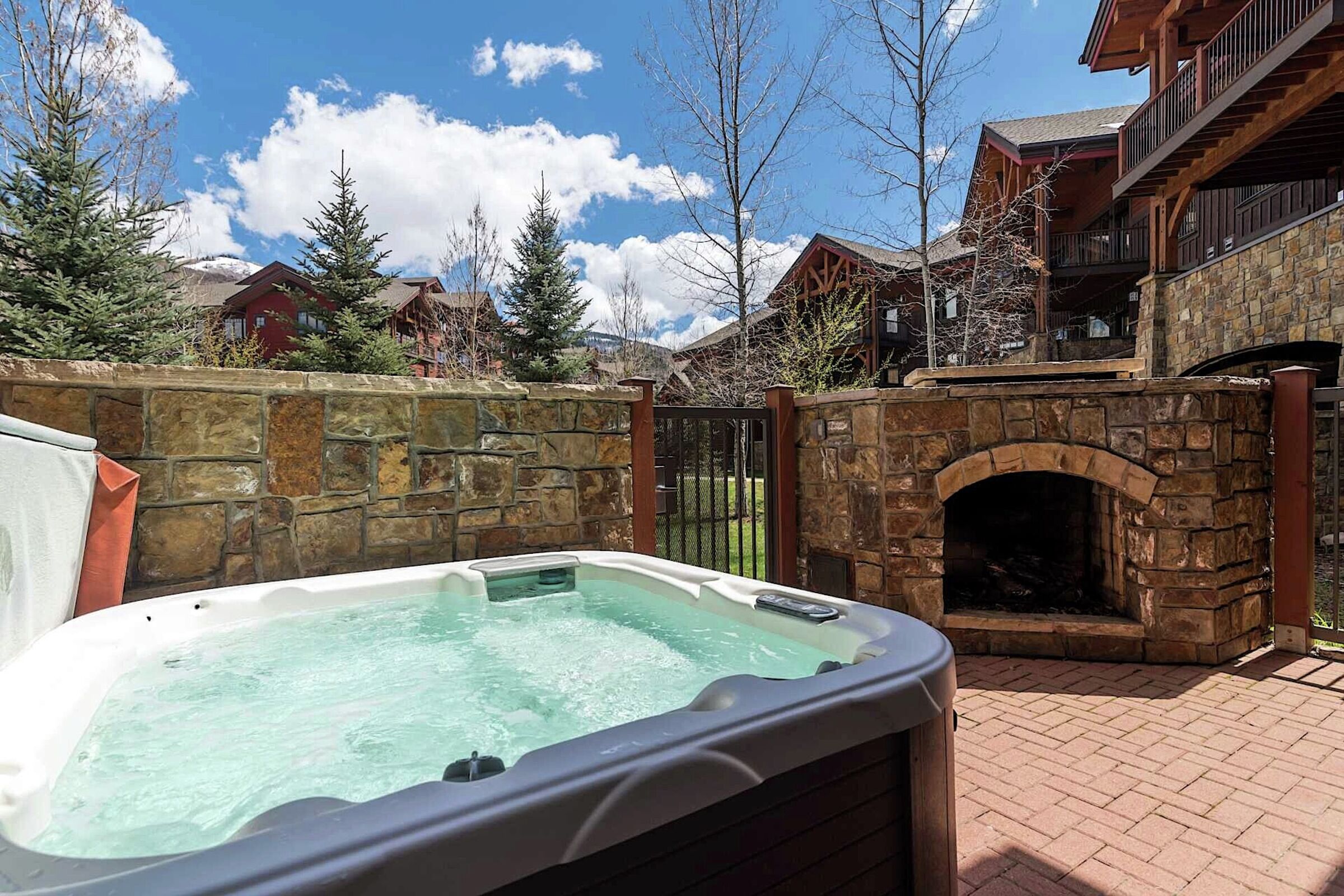 Patio with Hot Tub & Outdoor Fireplace
