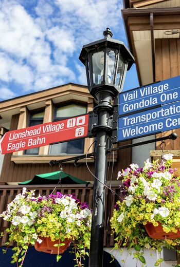 Directional sign in village