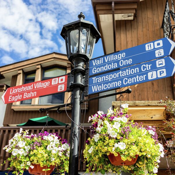 Directional sign in village